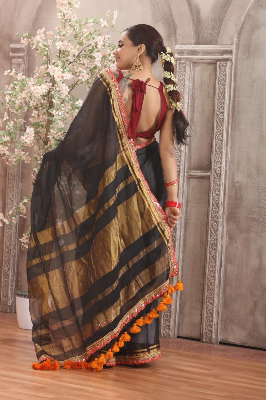 Glamorous Black Tissue Saree with Designer Zari Border & Statement Tassels